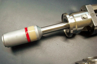 Kolv i fyllningsanläggning med iglidur® glidlager