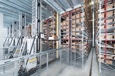 DEMATIC staplingskran med igus® guidelok styrränna