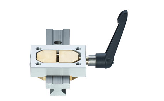 drylin T klämelement och manuellt klämfäste för skenstyrning