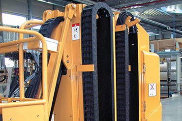 Grove Manlift med vikt energikedja på minimalt utrymme